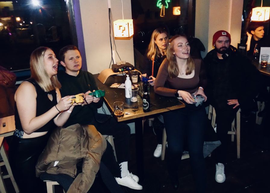 Copenhagen: Social Nightlife Pub Crawl with Shots & Games - Playing PacMan, Time Crisis, pinball, and Crazy Taxi