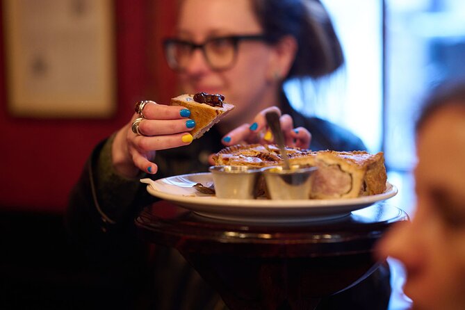 Devour London Historical Pub Tour:Traditional British Food & Ales - Stop 3: Ye Olde Cheshire Cheese (15th century) and devilled whitebait with stout