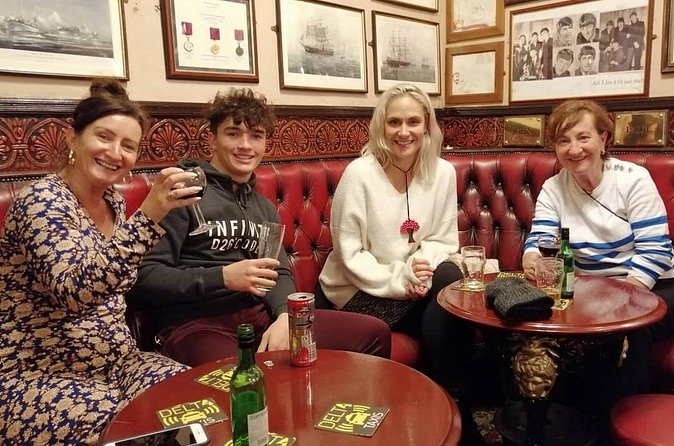 Evening Walking Historical Pub Crawl in Liverpool - Stop 3: Ye Cracke for your first drink and John Lennon ties