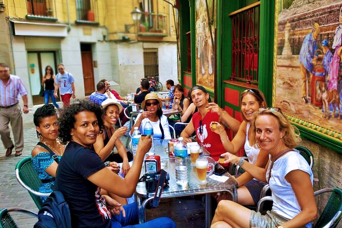 Flavours & Flamenco in Madrid Experience + Pub Crawl - Madroño, caña, and tapas: eating like locals in a timed setting