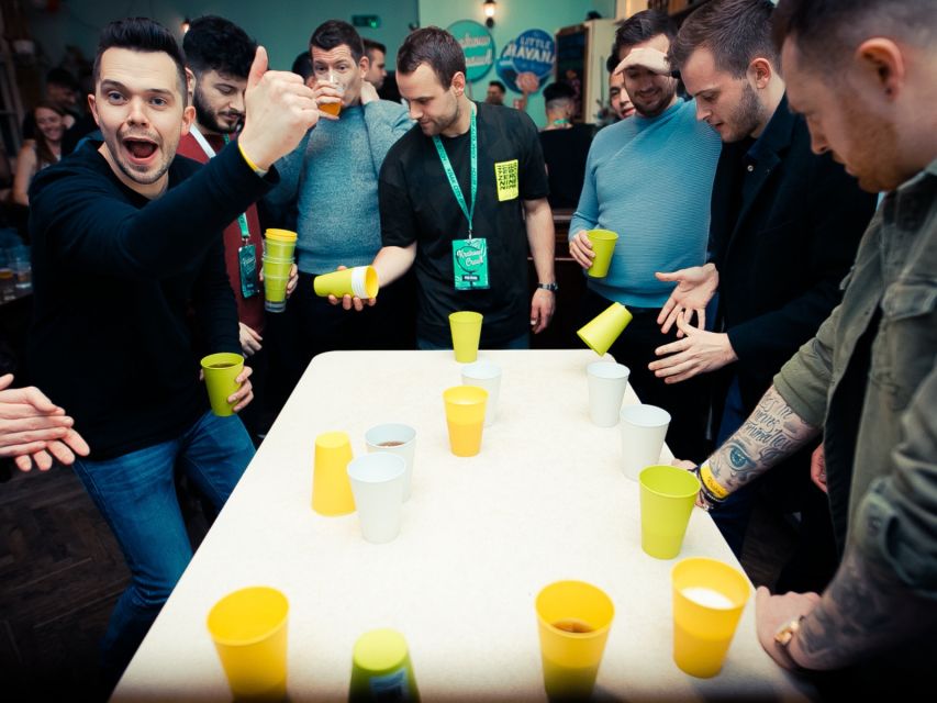Krakow: Pub, Bar & Club Crawl - The 10 PM warm-up bar: 1 hour of unlimited drinks and games