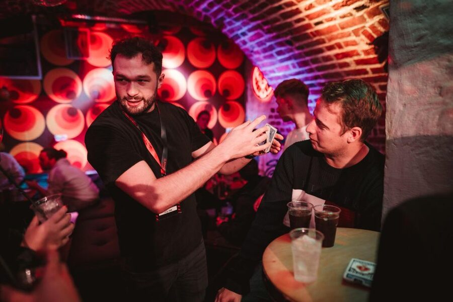 Krakow: Pub Crawl with 1 Hour of Unlimited Alcoholic Drinks - Stop One’s Drinking Games: Flip Cup, Beer Pong, and Flip Coin