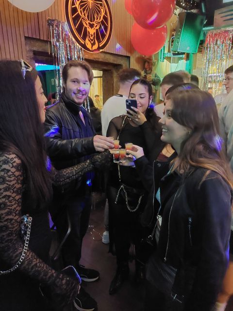 Lisbon Pub-crawl: 1h of open bar, Shots and VIP Club Entry - Bairro Alto Guide Time: A Social Warm-Up, Not a Museum Tour