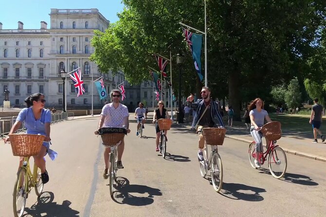 London Bike Tour: Landmarks, Secret Gems, Pub Stop & Street Art - Cleopatra’s Needle, the London Eye, and Westminster Bridge under Big Ben