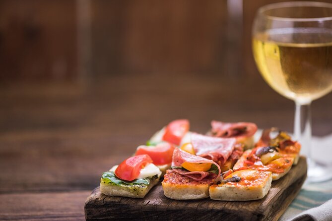 Madrid Tapas and Mysteries Walking Tour with Private Option - The pub crawl finale: four bars, shots, discounts, and nightclub entry