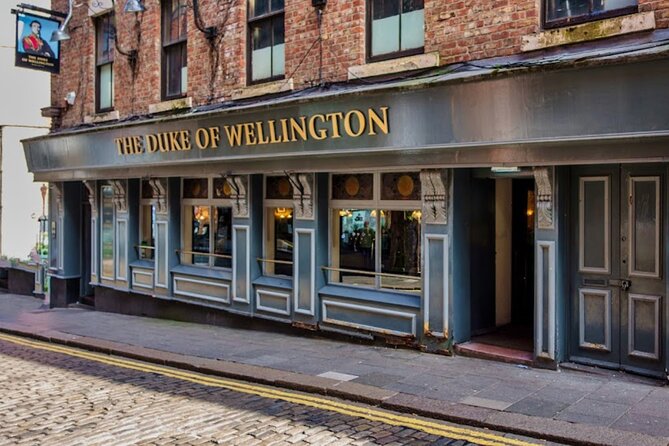 Newcastle Upon Tyne Private Historic Pub Tour With Free Drinks! - Brief landmark hits: Lit & Phil, city walls, and a castle that shaped the name