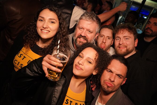 Private Pub Crawl in Lisbon - Stop 2 in Bairro Alto: first bar, first welcome shot, then off you go