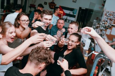 Pub Crawl + Unlimited Drinks + VIP entry + Drinking Games & Photographer - The First Stop Around the Open-Bar Hour