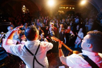 Pub Crawl- Your best night out in Riga with our local guide! - Meeting at St. Peter’s Church and how the timing usually works